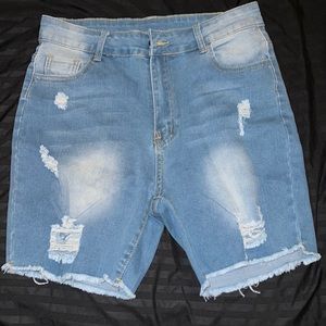 Ripped raw hem denim shorts